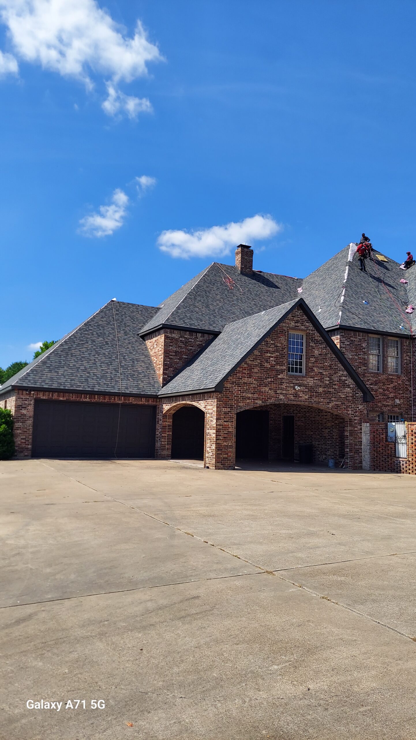 Residential roofing installation by Team Texas Construction LLC